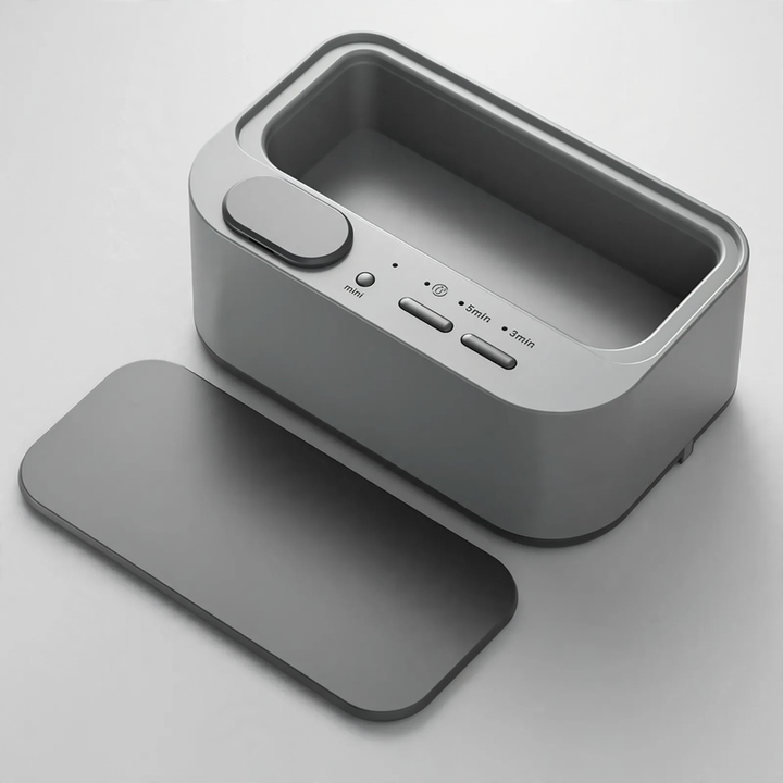 Double chamber ultrasonic cleaning device