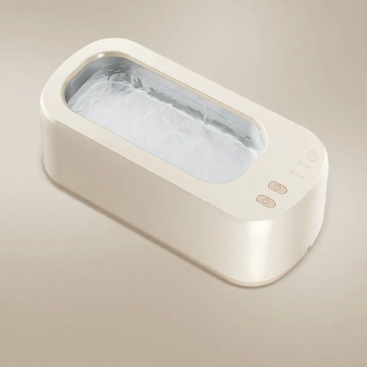 Double chamber ultrasonic cleaning device