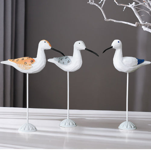 Wood bird figure in Mediterranean style