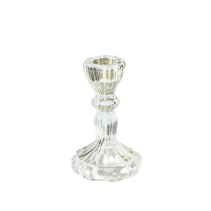 Transparent glass candle holder with structured pattern