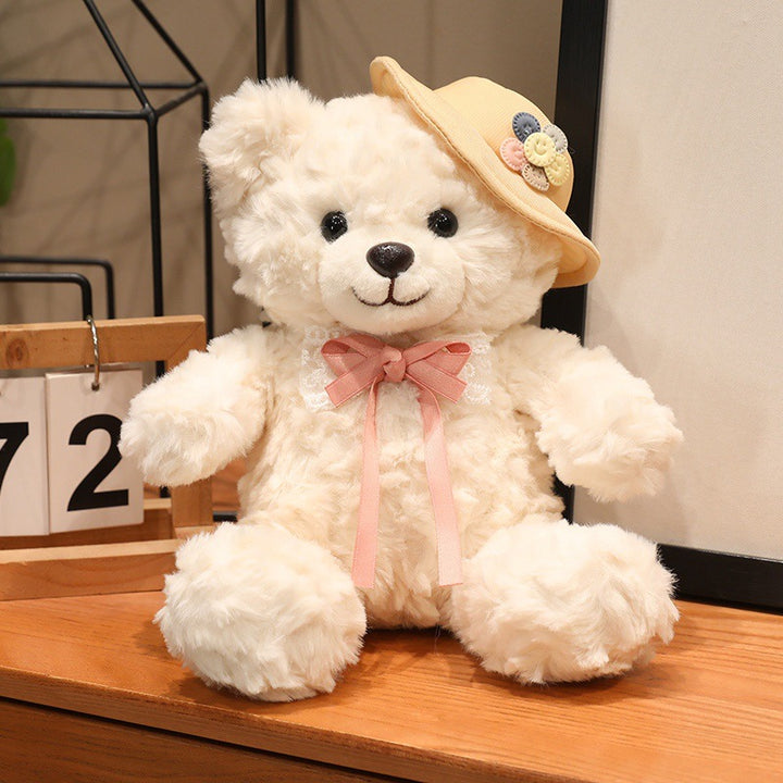 Large plush teddy bear with silk ribbon