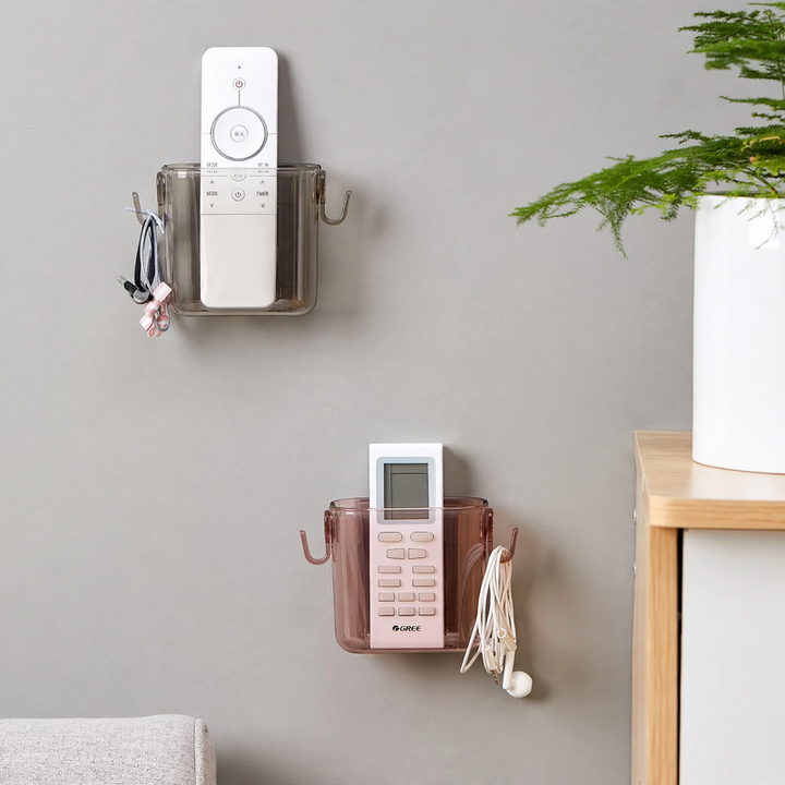 Wall-mounted storage box for remote controls and phones