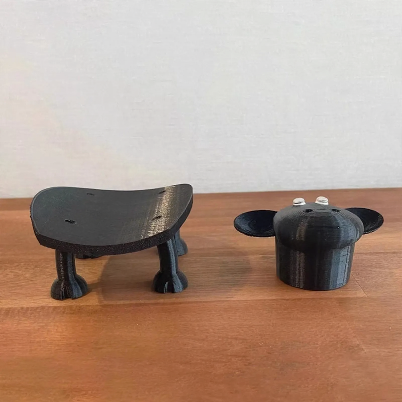 Toilet paper holder made of synthetic resin, sheep design