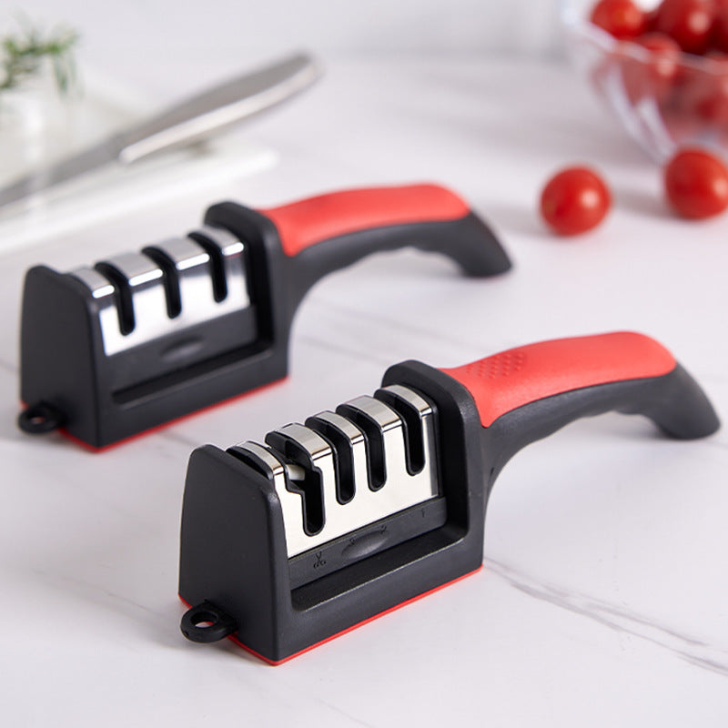 Knife sharpener with removable sharpening stone