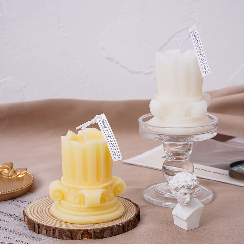 Handmade scented candle made of soy wax, pillar shape