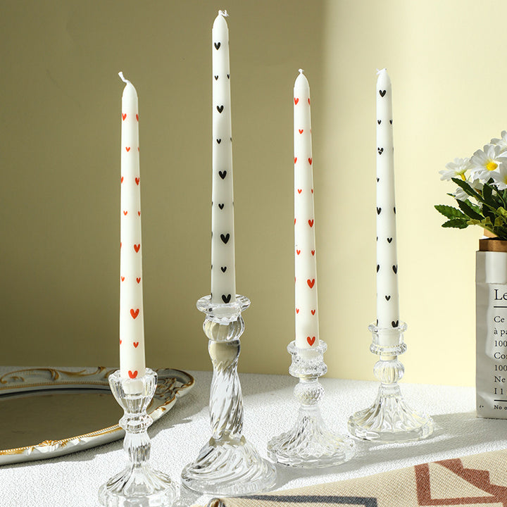 Transparent glass candle holder with structured pattern