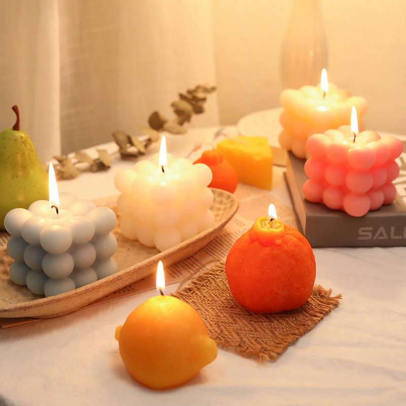 Handcrafted scented candle made of soy wax, fruit shape