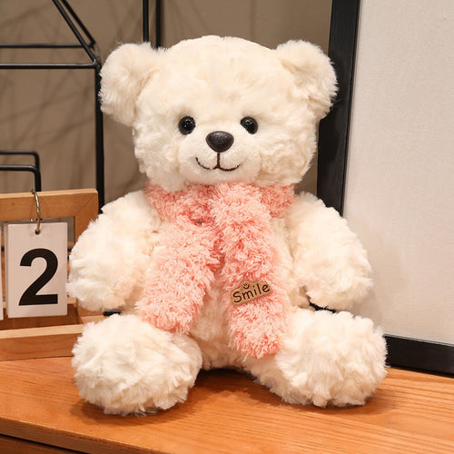 Large plush teddy bear with silk ribbon
