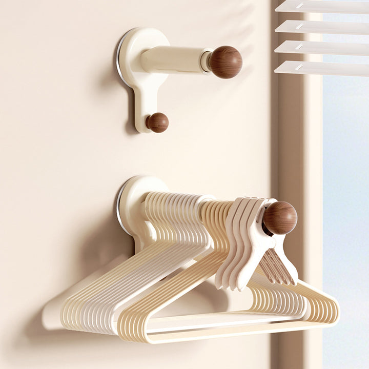 Extendable clothes rail, wall-mounted, without drilling