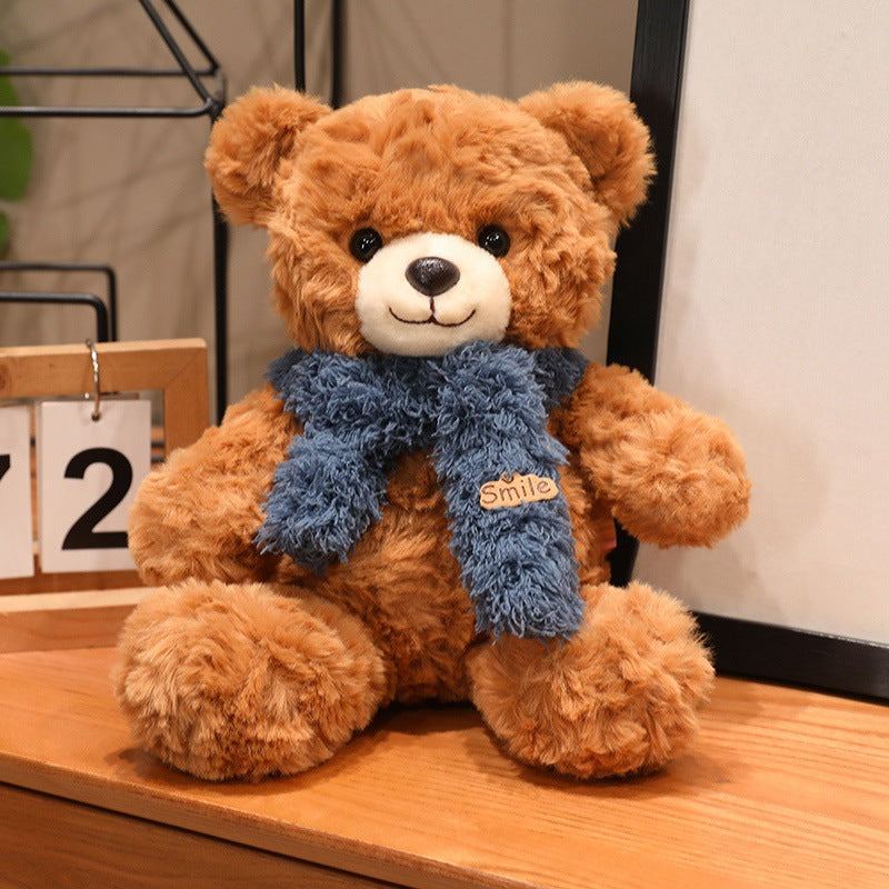 Large plush teddy bear with silk ribbon