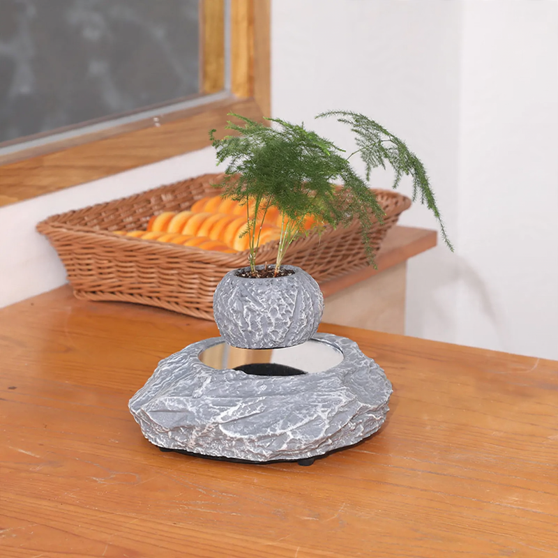 Magnetically levitating Bluetooth speaker with ambient light