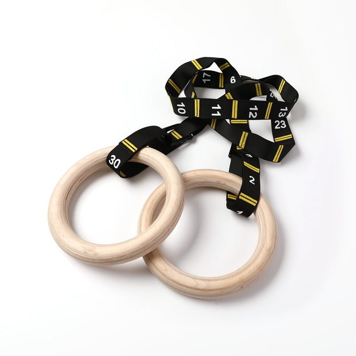 Wooden gymnastics rings with strap