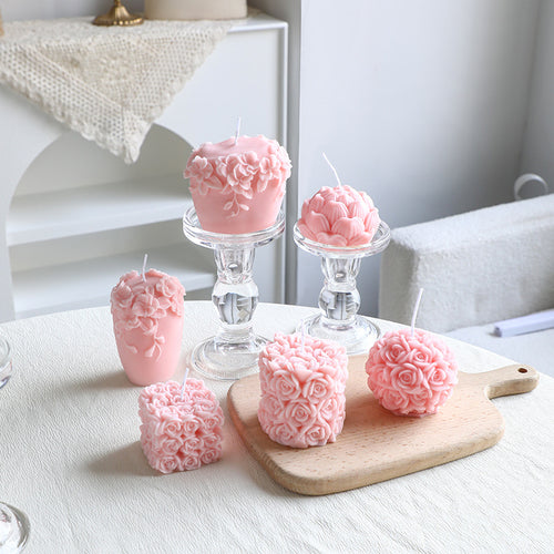 Rose-colored scented candle made from soy wax, handcrafted