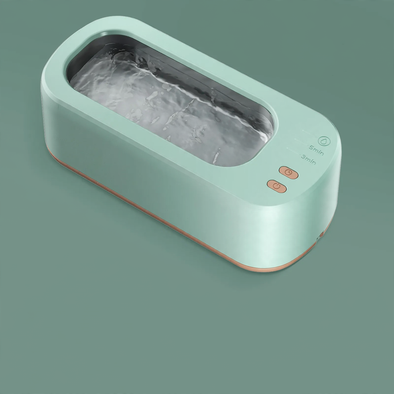 Double chamber ultrasonic cleaning device