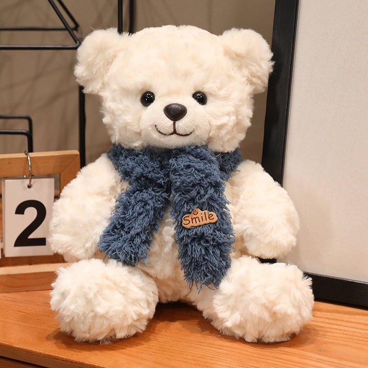 Large plush teddy bear with silk ribbon