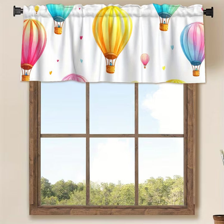 Window curtain with hot air balloon motif