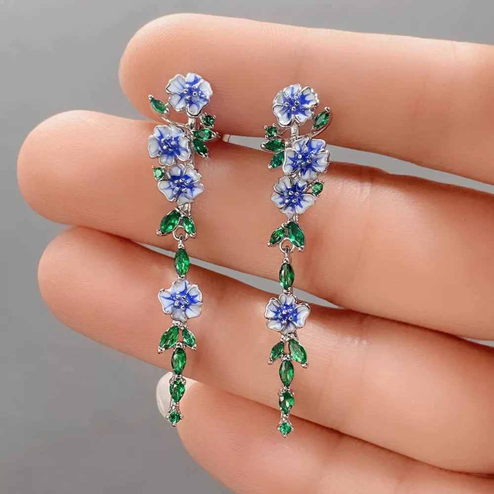 BowLift | Glossy Blue Floral Dangling Earrings