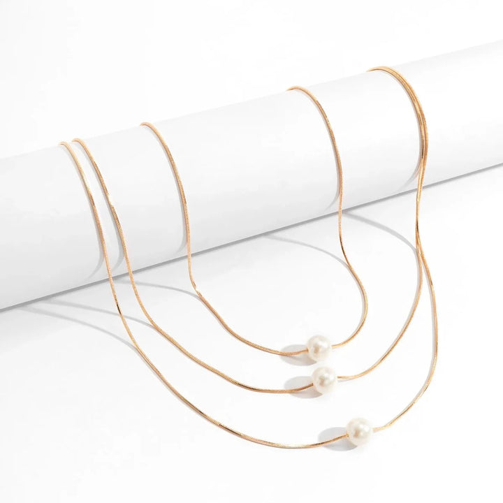 BowLift | Layered Pearls Strung On Rope Necklace