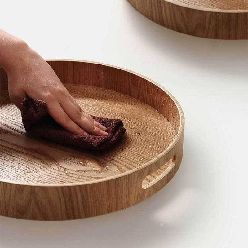BowLift | Slim, round serving trays made of wood