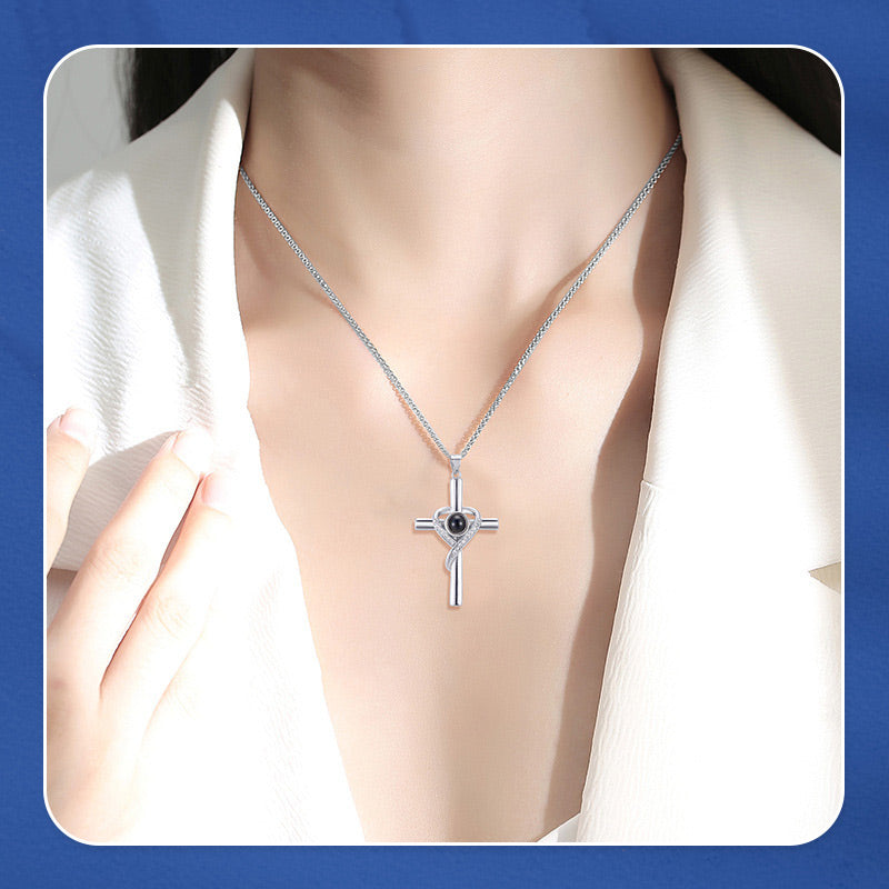 BowLift | Cross necklace with "I love you" projection in 100 languages